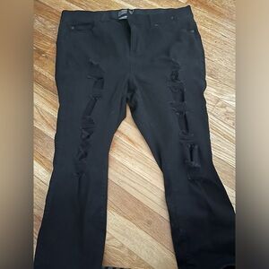 Bombshell skinny torrid jeans. Solid black with rips. No tags but never worn